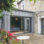 An elegant zinc extension houses a master suite