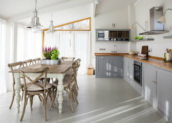 10 rules for the design of a kitchen-dining room in a private house: from layout to decor