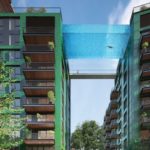 In London, a swimming pool suspended between 2 towers